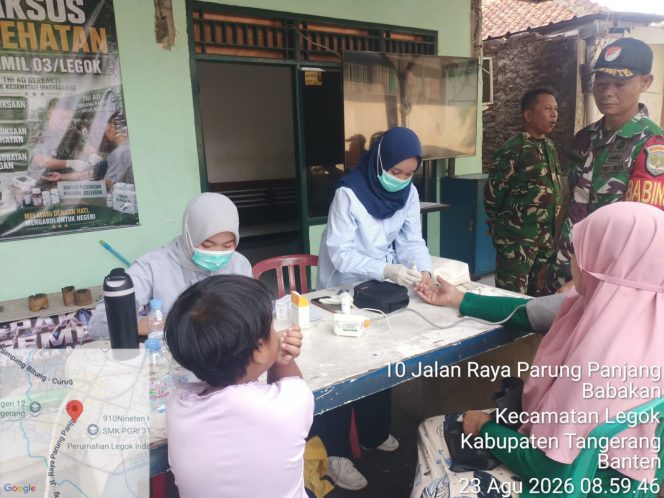 
					Jaga Jakarta On The Spot, Koramil 03/ Legok Berikan Layanan Kesehatan dan Sembako Gratis